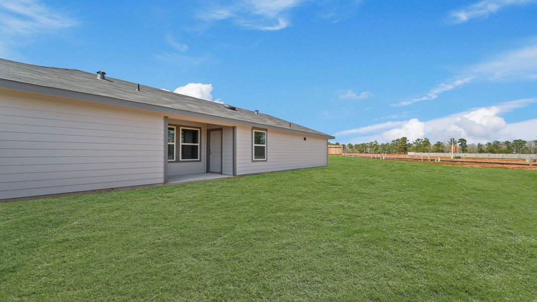 Exterior details and patio area of a home in Castles Edge, Willis (Image 3).