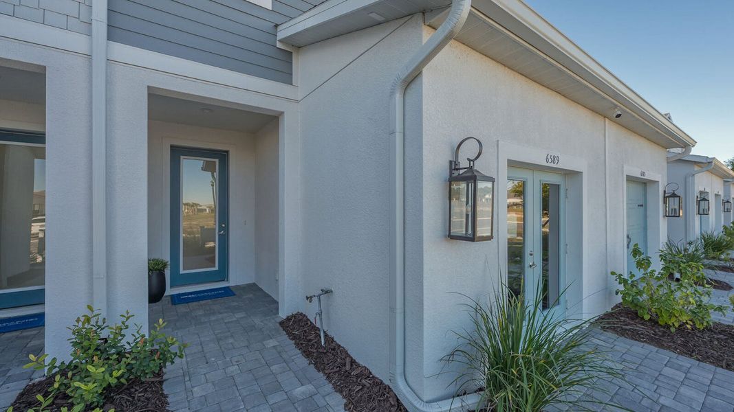 Exterior details and patio area of a home in Grand Park Real Estate and Homes for Sale in Sarasota, FL - Neal Communities, Sarasota (Image 24).