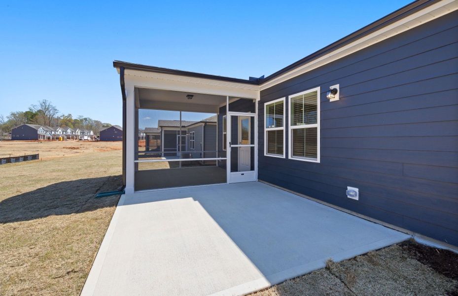 Exterior details and patio area of a home in Exchange at 401, Raleigh (Image 19).
