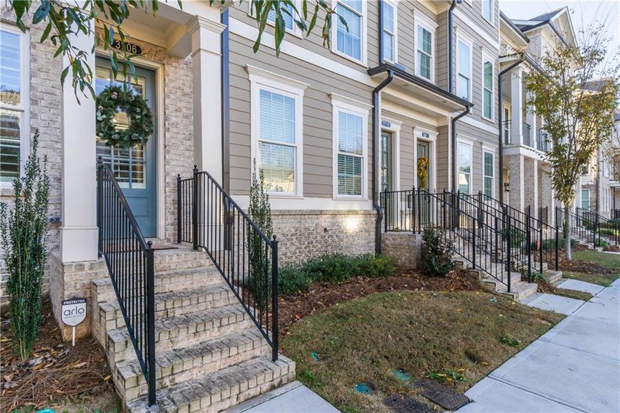 Exterior details and patio area of a home in Evanshire Single Family, Duluth (Image 3).