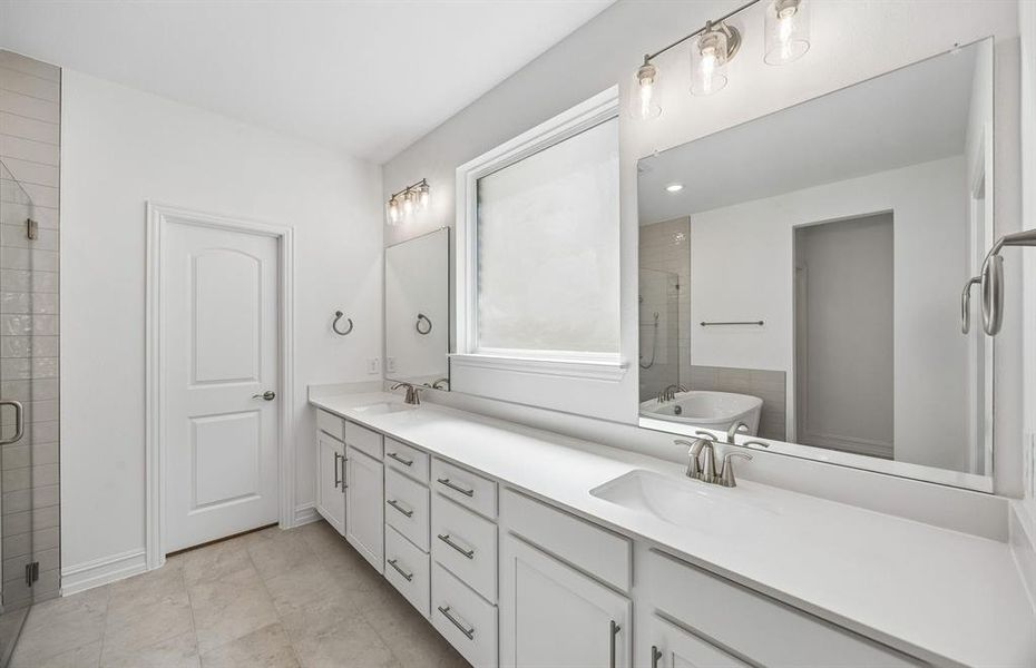 Primary bath with two vanities