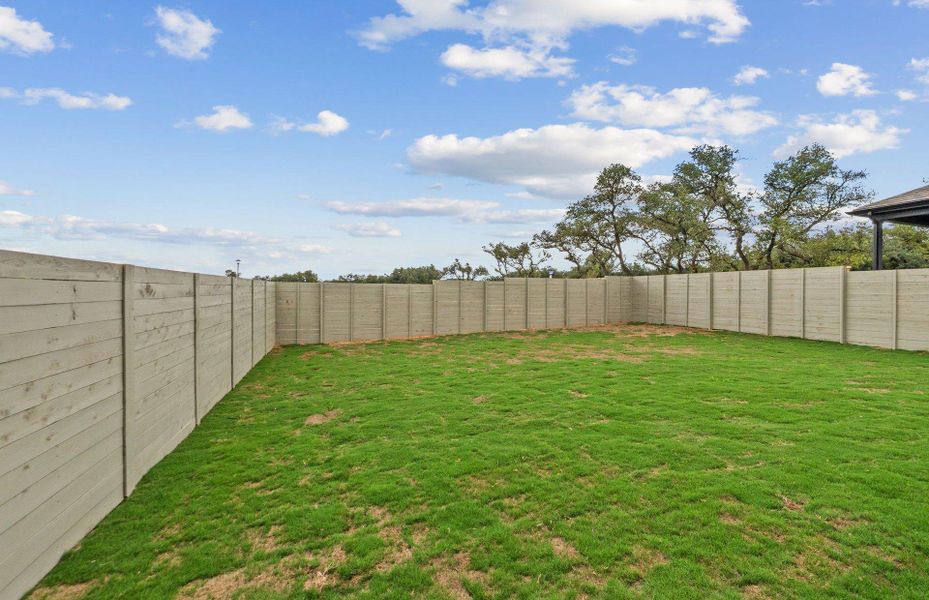 Exterior details and patio area of a home in Wolf Ranch, Georgetown (Image 23).