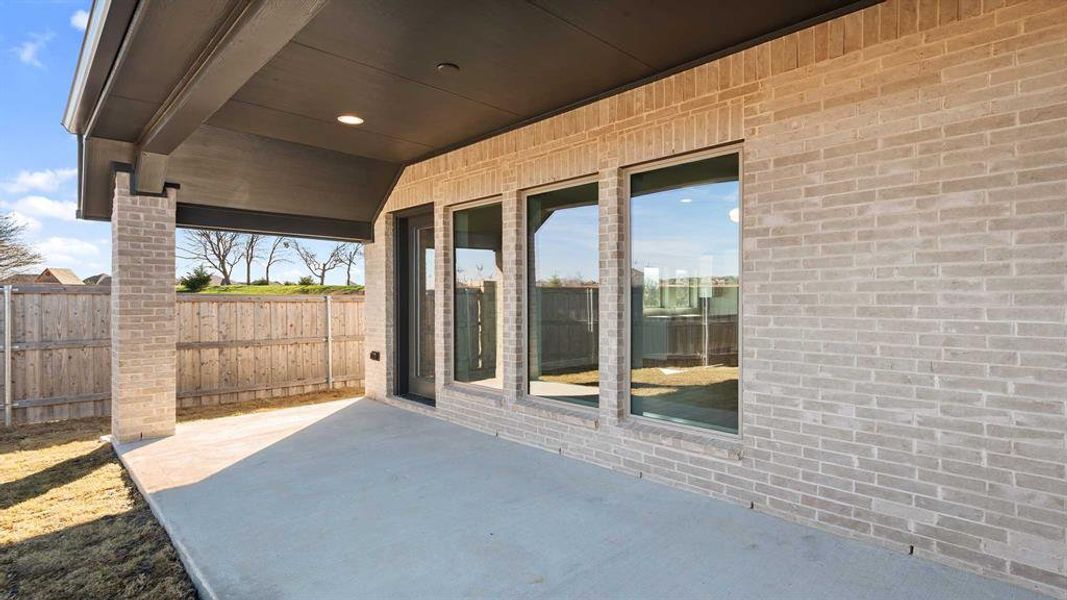 Exterior details and patio area of a home in Devonshire - Reserve 50', Forney (Image 2). Exterior details and patio area of a home in Devonshire - Reserve 50', Forney (Image 2).