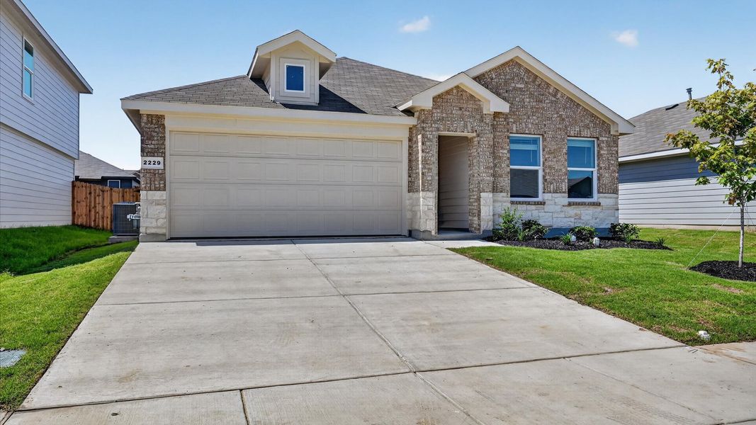 Representative exterior photo of a completed home built from the Anderson by D.R. Horton in Sunnycreek, Crowley, TX (Image 19). Representative exterior photo of a completed home built from the Anderson by D.R. Horton in Sunnycreek, Crowley, TX (Image 19).