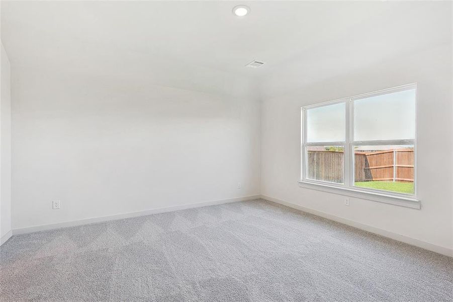 Empty room featuring carpet floors