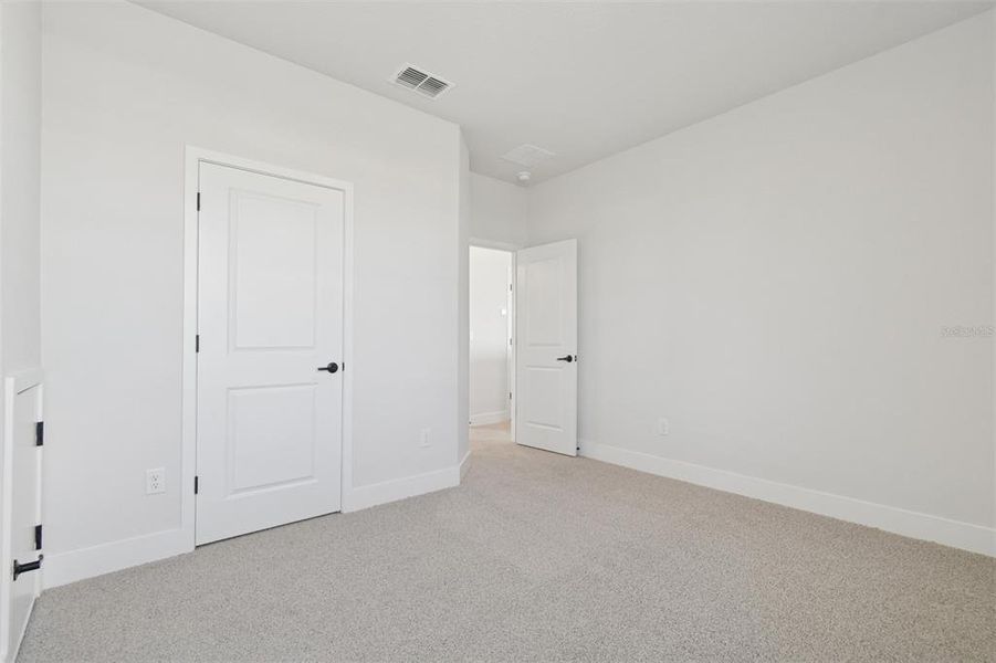 Spacious, unfurnished interior of a new home in Waterset Tradition Series, Apollo Beach (Image 29).