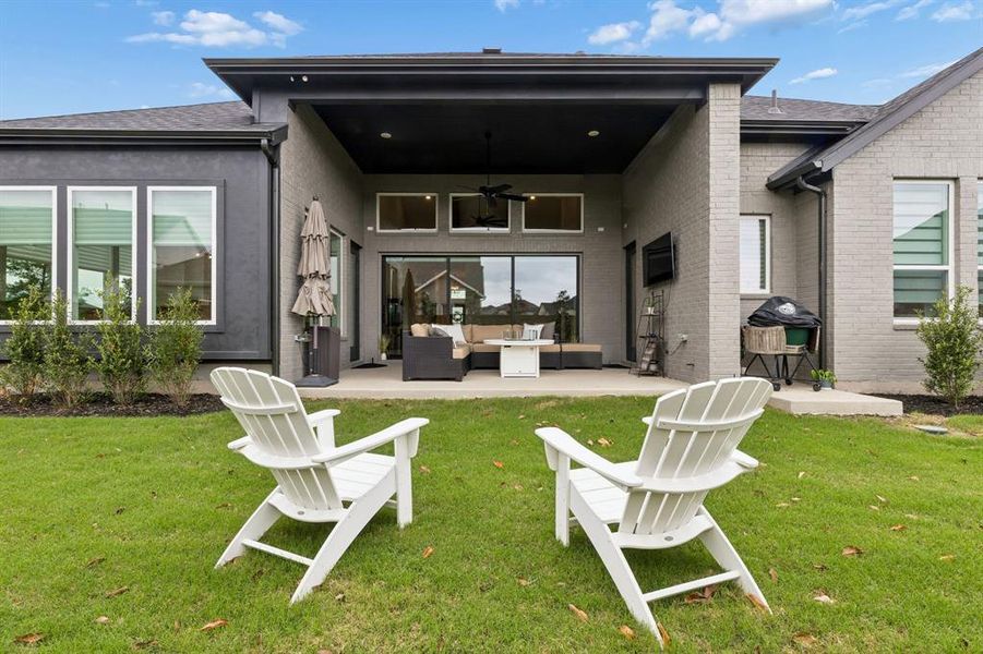 Exterior details and patio area of a home in Windsong Ranch 71' Series, Prosper (Image 20).