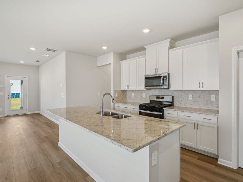 Furnished interior view inside a new home in Northwoods at Mirror Lake, Villa Rica (Image 5).