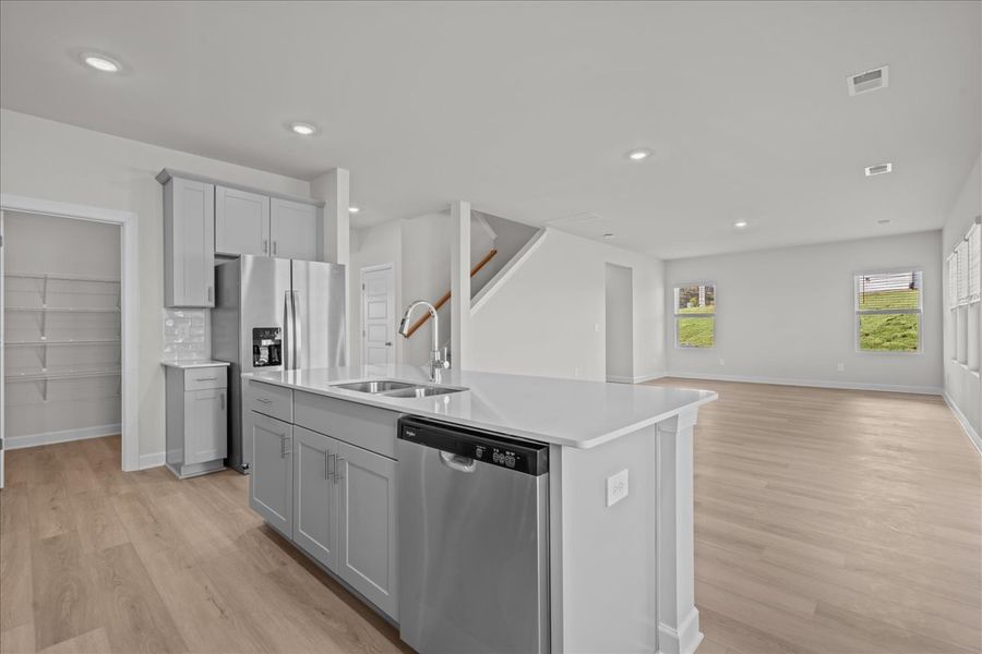 Furnished interior view inside a new home in The Farm at Wells Creek - Signature Collection, Gray Court (Image 5).