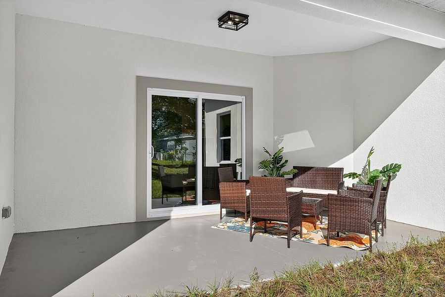 Exterior details and patio area of a home in , Vero Beach (Image 26). Exterior details and patio area of a home in , Vero Beach (Image 26).