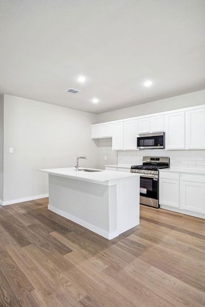 Kitchen in the Willow home plan by Trophy Signature Homes – REPRESENTATIVE PHOTO Kitchen in the Willow home plan by Trophy Signature Homes – REPRESENTATIVE PHOTO