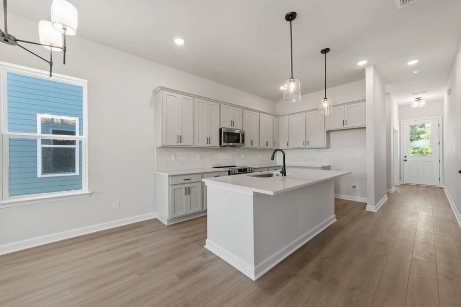 Furnished interior view inside a new home in Blue Heron Retreat, Little River (Image 7).