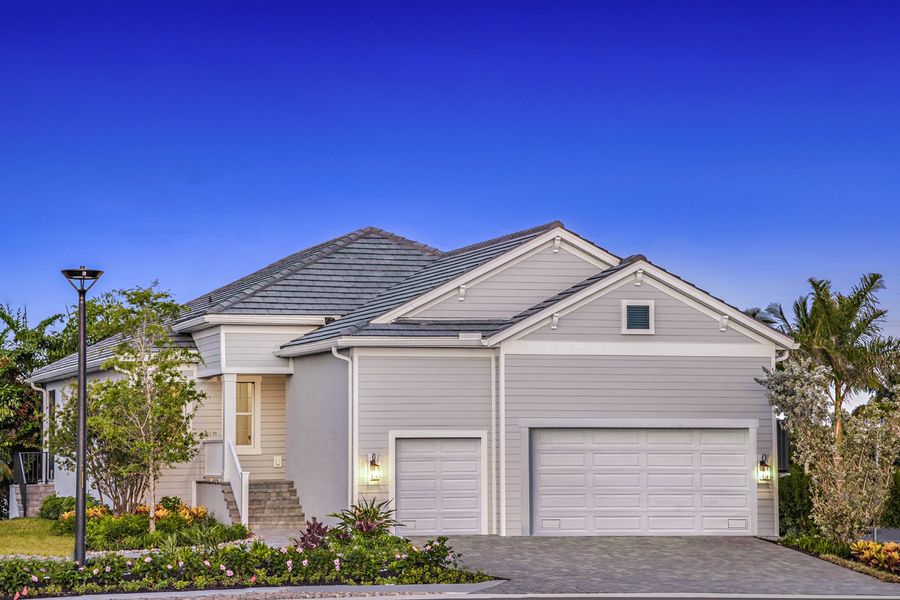 Representative exterior photo of a completed home built from the Meadow Brook by Neal Communities in Tide Marsh, Fort Myers, FL (Image 17).