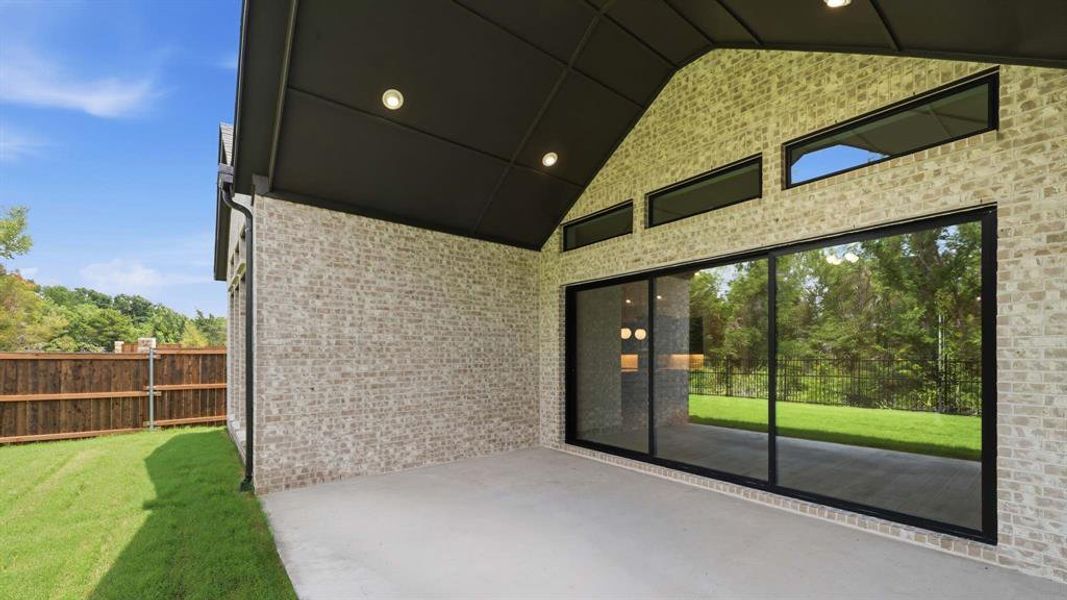 Exterior details and patio area of a home in The Parks at Wilson Creek, Celina (Image 3).