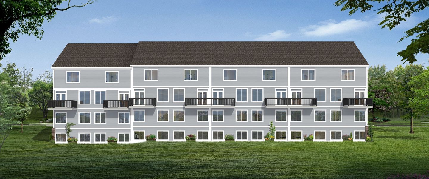 Representative exterior photo of a completed home built from the The Keswick  Townhome (End Viewout) by Norfolk Homes in Bristol Ridge Townhomes, Ann Arbor, MI (Image 25).
