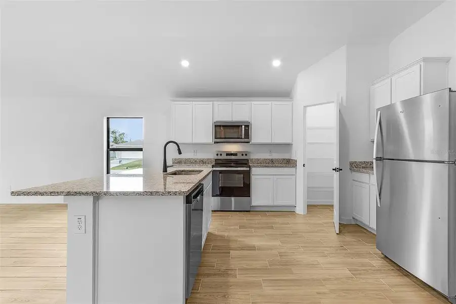 Furnished interior view inside a new home in , North Port (Image 4).