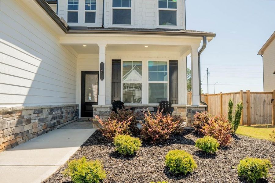Exterior details and patio area of a home in Park at Ansleigh Farms, Dallas (Image 29).