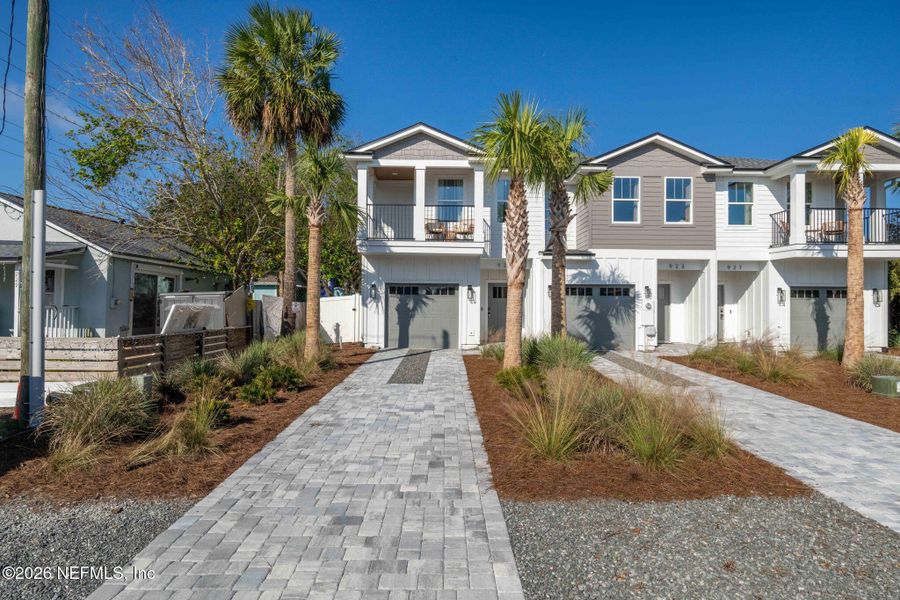Front exterior of a new home in , Jacksonville Beach, FL, highlighting curb appeal (Image 21).