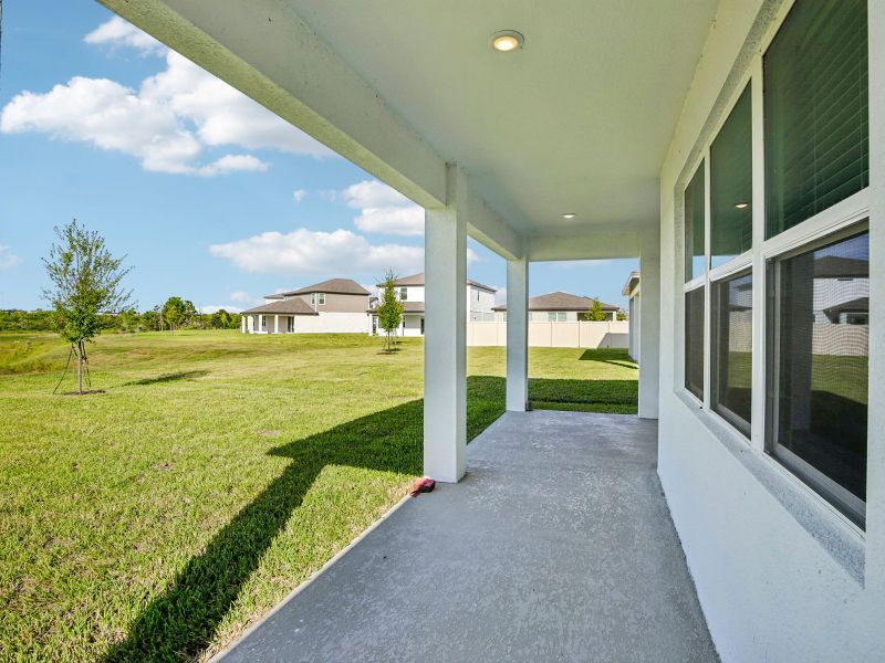 Exterior details and patio area of a home in Magnolia Bay - Reserve Series, Nokomis (Image 4).