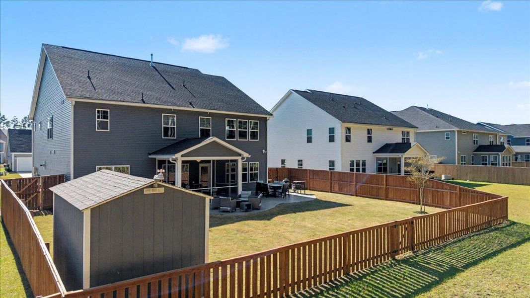 Exterior details and patio area of a home in Hewing Farms, Summerville (Image 28). Exterior details and patio area of a home in Hewing Farms, Summerville (Image 28).