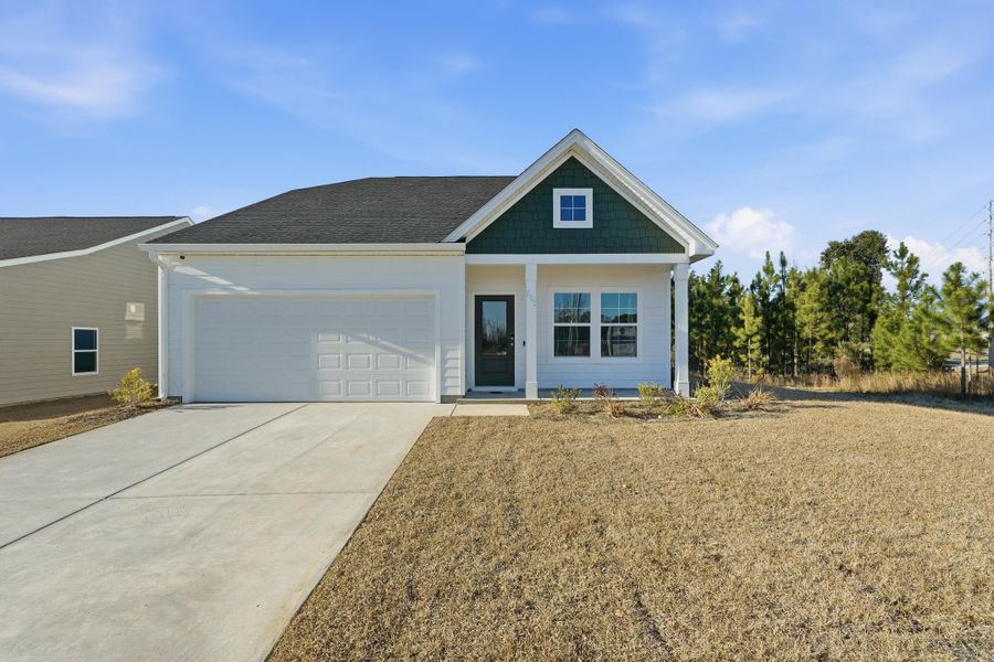 Front exterior of a new home in , Summerville, SC, highlighting curb appeal (Image 21).