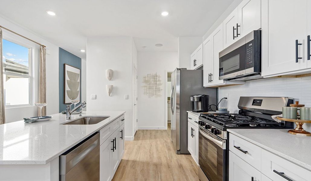 Representative furnished interior of a home built from the Carolina by D.R. Horton in Redford Estates, Tucson (Image 10).
