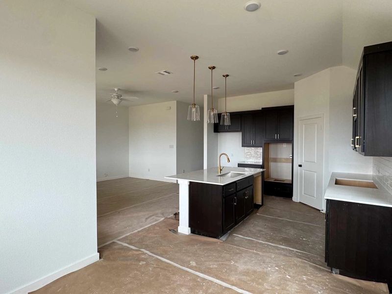 Open Kitchen-Living-Dining Room Construction Progress featuring the Oxford Collection