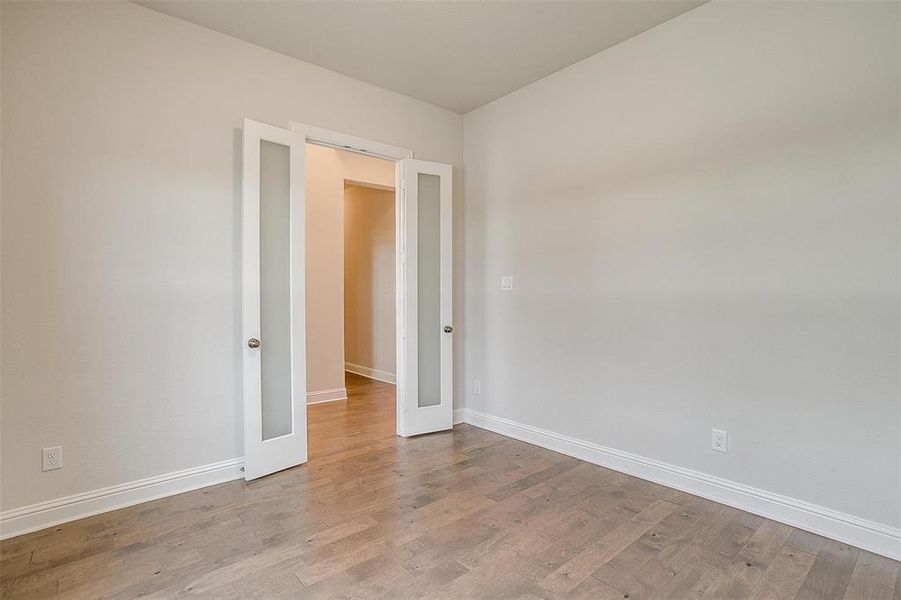 Spare room featuring light hardwood / wood-style floors