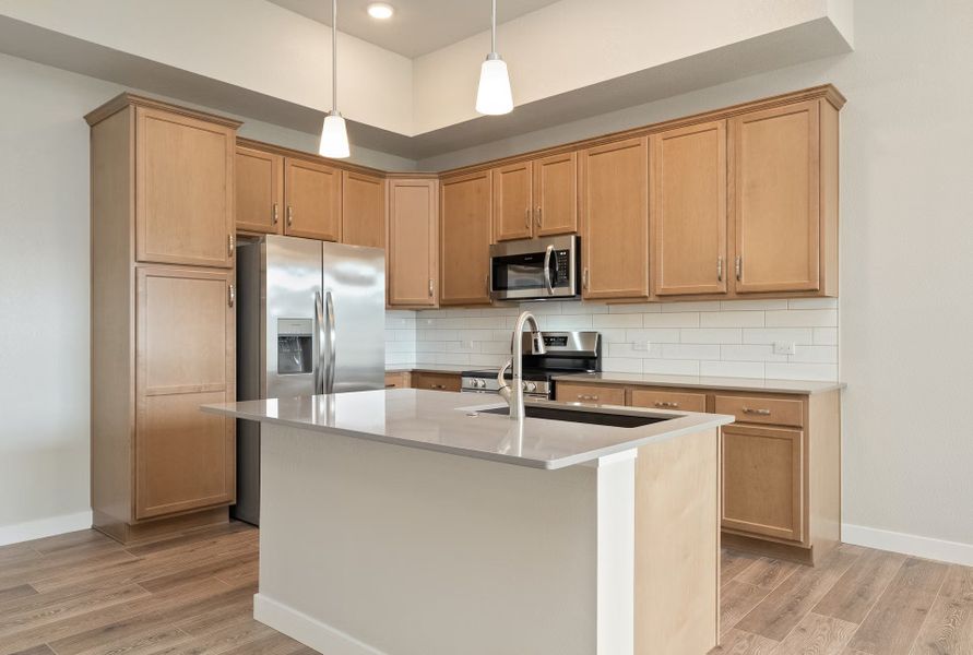 Furnished interior view inside a new home in The Lakes at Centerra - Discovery, Loveland (Image 12).