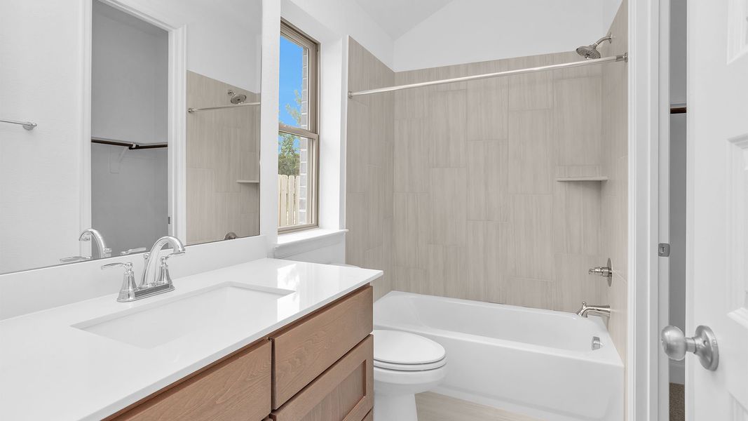 Furnished interior view inside a new home in COLTON, Todd Mission (Image 9).