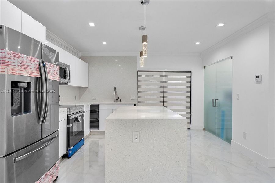 Furnished interior view inside a new home in , Hialeah (Image 4).