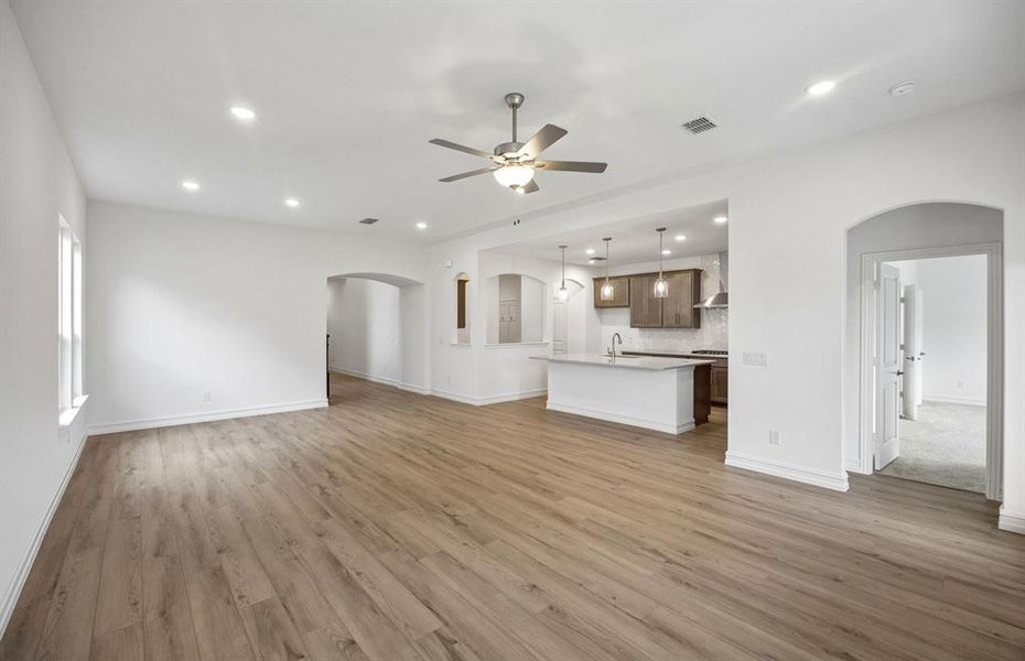 Spacious gathering room with beautiful flooring