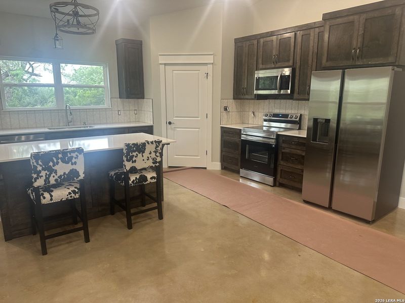 Furnished interior view inside a new home in , Karnes City (Image 7).