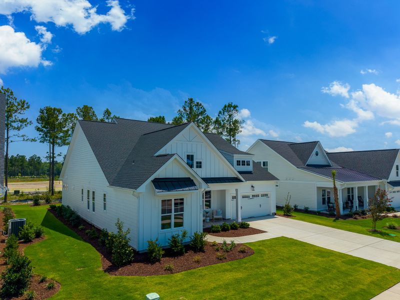 Front exterior of a new home in Terrapin, Leland, NC, highlighting curb appeal (Image 2). Front exterior of a new home in Terrapin, Leland, NC, highlighting curb appeal (Image 2).