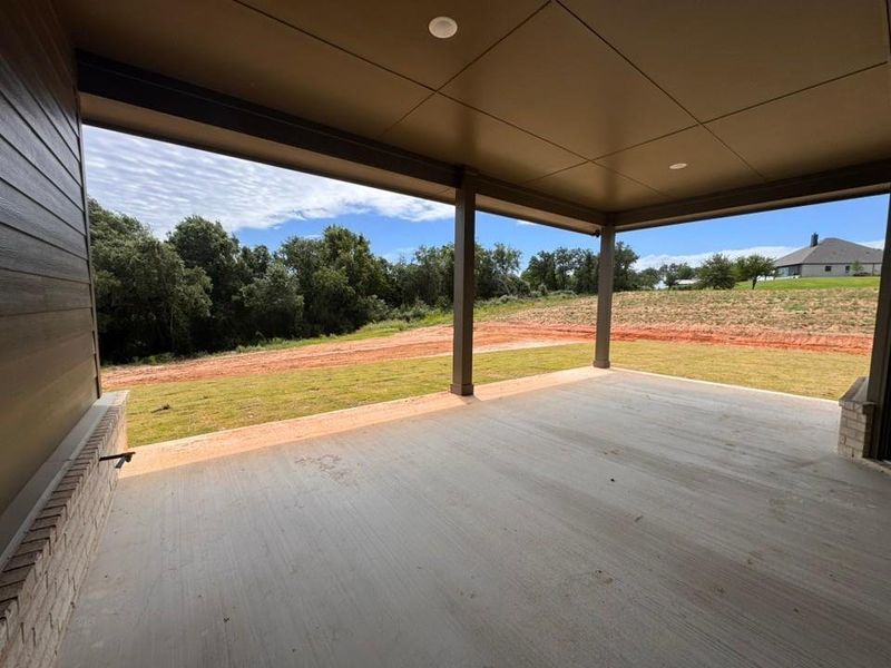 Exterior details and patio area of a home in Oak Grove Addition, Springtown (Image 10).