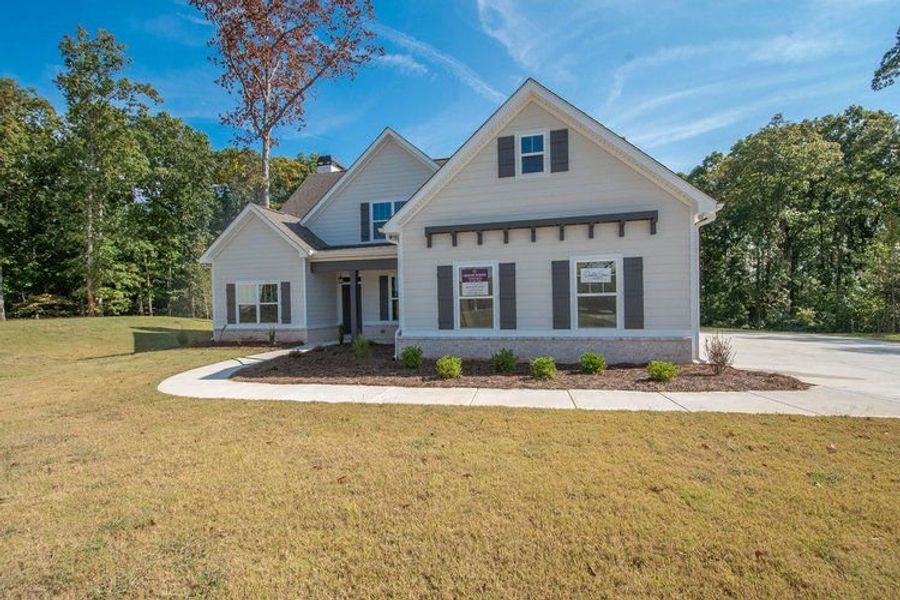 Front exterior of a new home in Highgate, Newnan, GA, highlighting curb appeal (Image 15).