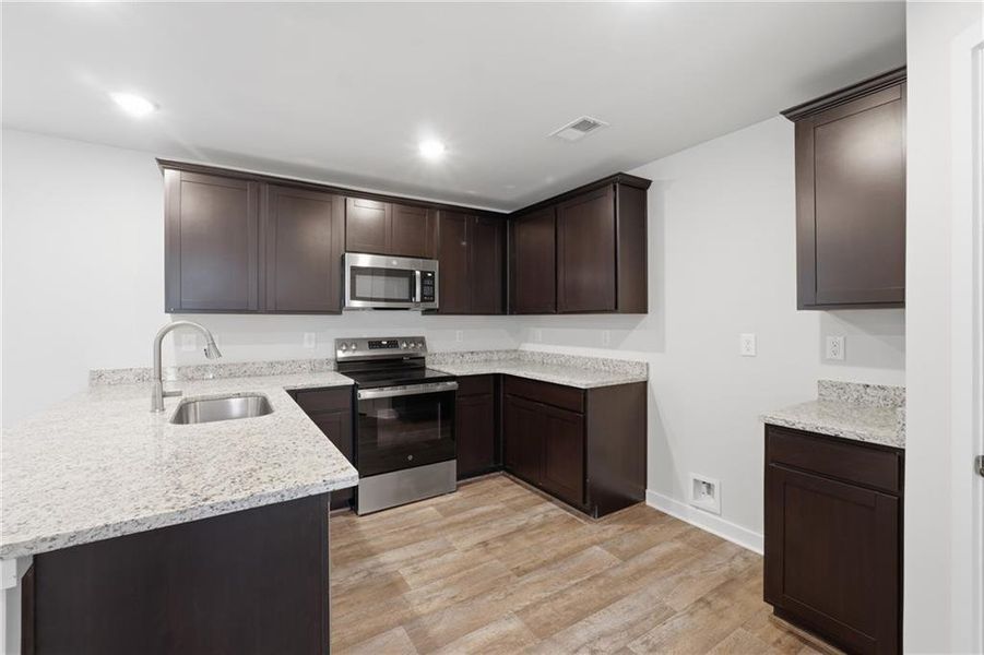 Furnished interior view inside a new home in The Enclave at Stonewall Station, Union City (Image 10).