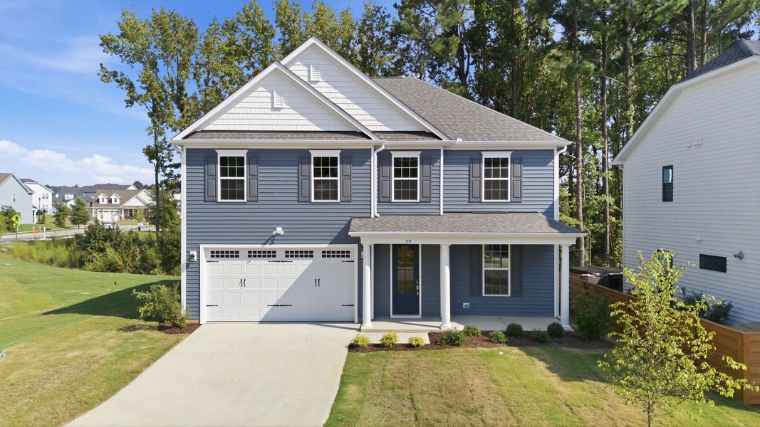 Representative exterior photo of a completed home built from the The Concerto by Chesapeake Homes in Highgate, Clayton, NC (Image 24).
