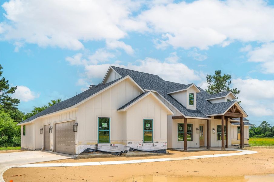 Front exterior of a new home in , Montgomery, TX, highlighting curb appeal (Image 23). Front exterior of a new home in , Montgomery, TX, highlighting curb appeal (Image 23).
