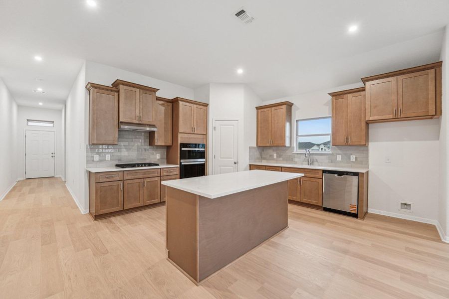 Furnished interior view inside a new home in Crosswinds, Kyle (Image 8).