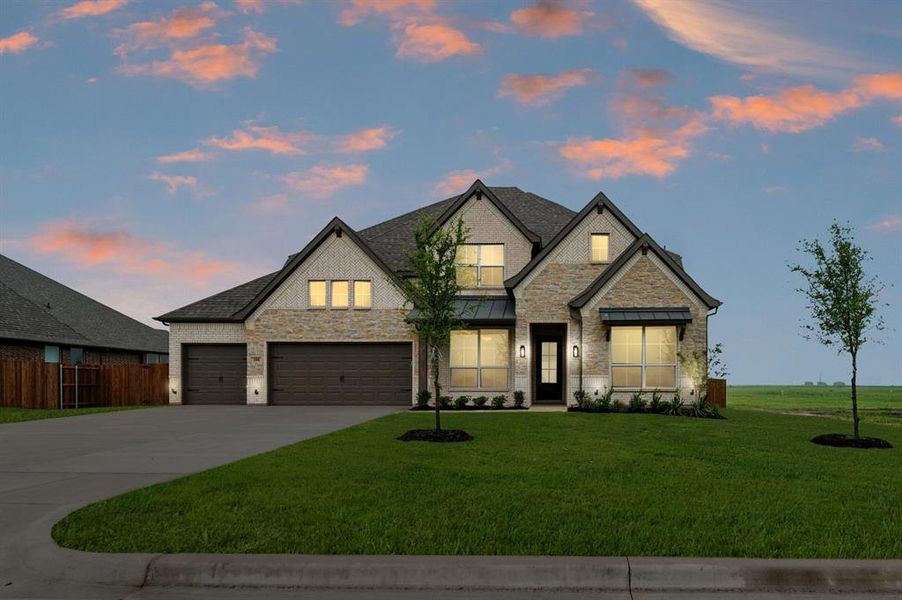 Front exterior of a new home in Coyote Crossing, Godley, TX, highlighting curb appeal (Image 18).