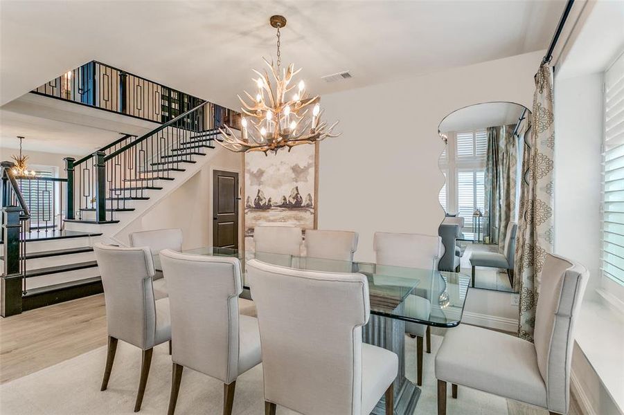 Furnished interior view inside a new home in Grand Braniff Park, Irving (Image 11).