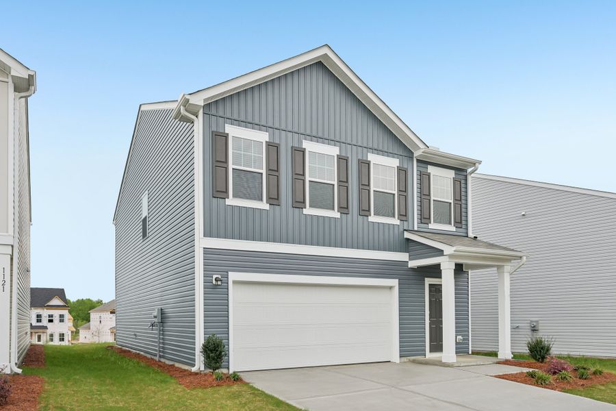 Representative exterior photo of a completed home built from the Voyager by Starlight Homes in The Point, Rolesville, NC (Image 21).