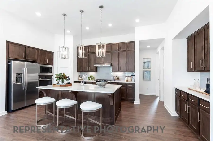Furnished interior view inside a new home in Wildridge, Oak Point (Image 23).