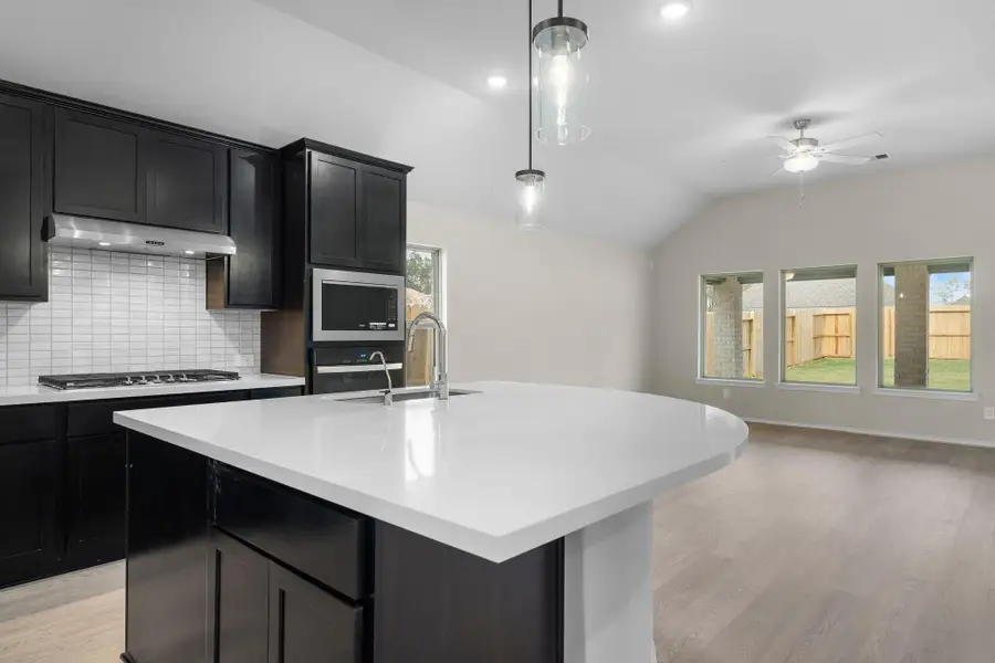 Furnished interior view inside a new home in The Highlands 45', Porter (Image 5).