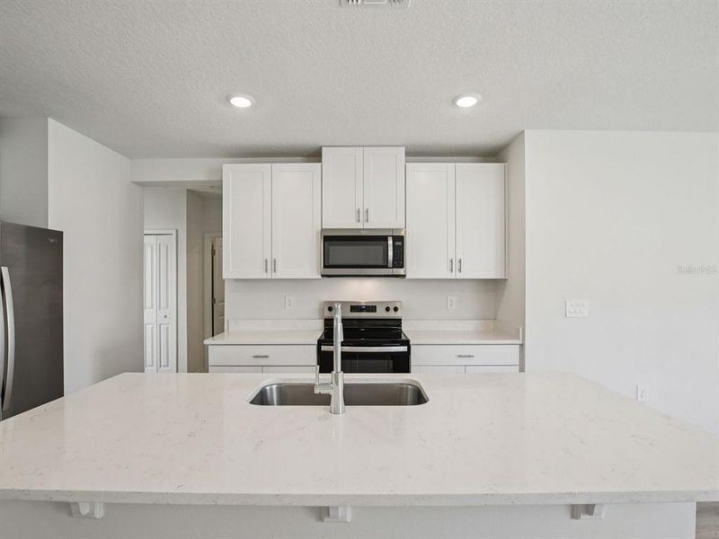 Furnished interior view inside a new home in Oakfield Trails - Premier Series, Parrish (Image 5).