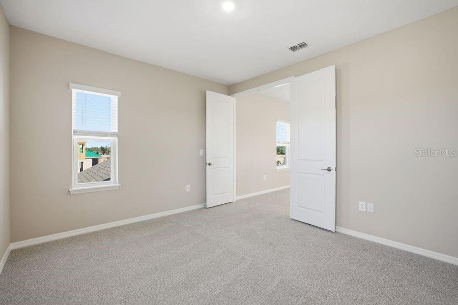 Spacious, unfurnished interior of a new home in Firethorn, Parrish (Image 35).