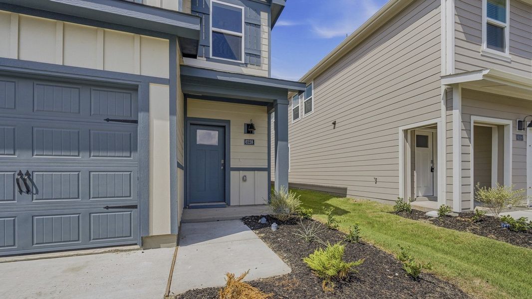 Exterior details and patio area of a home in Arbor Trails North, Princeton (Image 3).