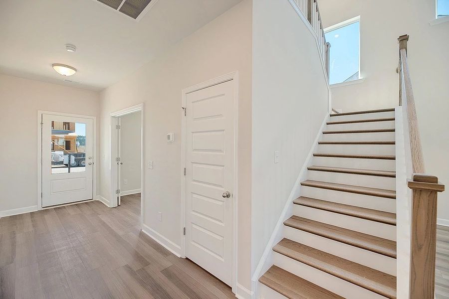 Representative unfurnished interior of a home built from the Monroe by Ashton Woods in Watson Hill, Summerville (Image 21). Representative unfurnished interior of a home built from the Monroe by Ashton Woods in Watson Hill, Summerville (Image 21).