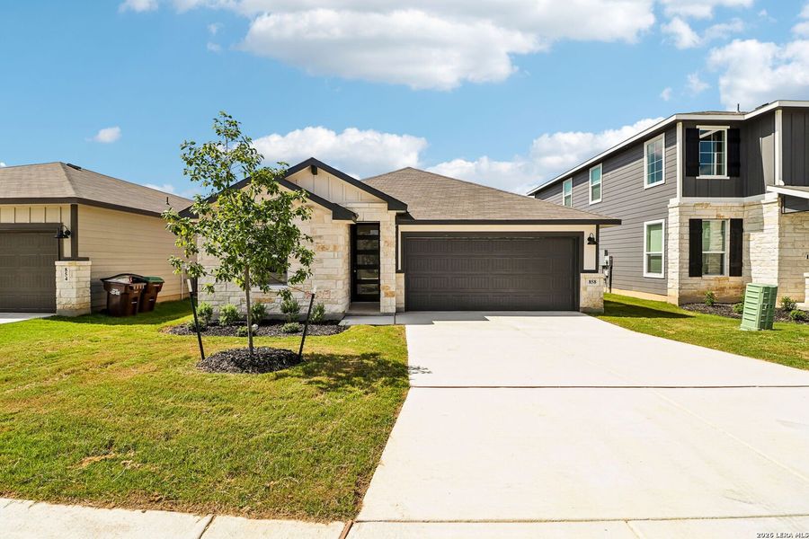 Front exterior of a new home in Estancia Ranch - Premier Series, San Antonio, TX, highlighting curb appeal (Image 25). Front exterior of a new home in Estancia Ranch - Premier Series, San Antonio, TX, highlighting curb appeal (Image 25).